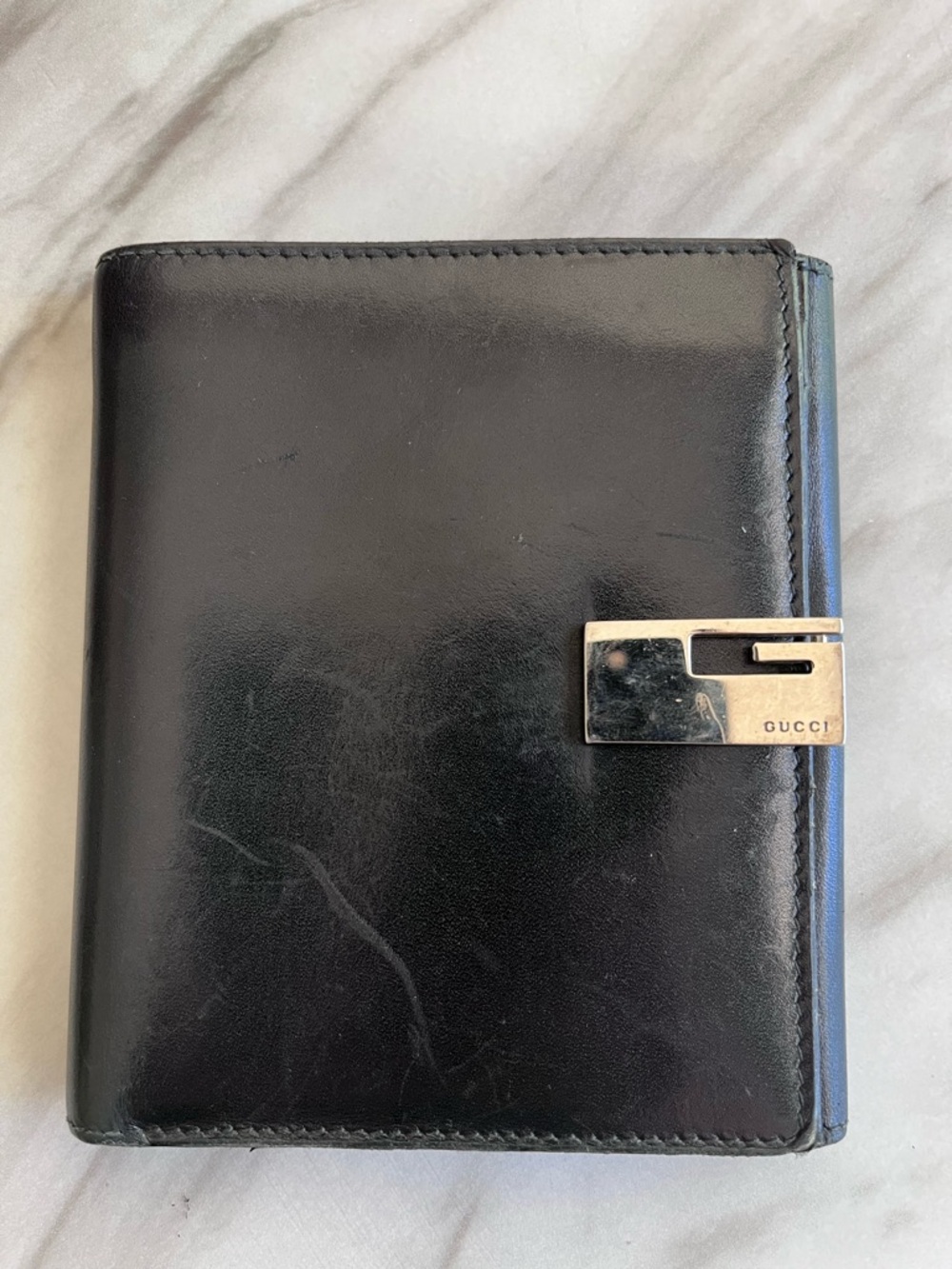 Vintage Gucci Black Leather Bifold Wallet with Gold Logo Clasp
